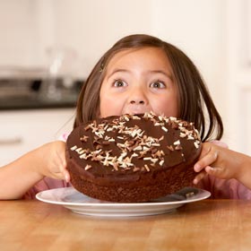 girl-eating-chocolate-cake-280X280